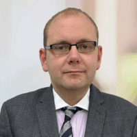 John Molleskog Profile Square Picture of a person in a cell awaiting extradition